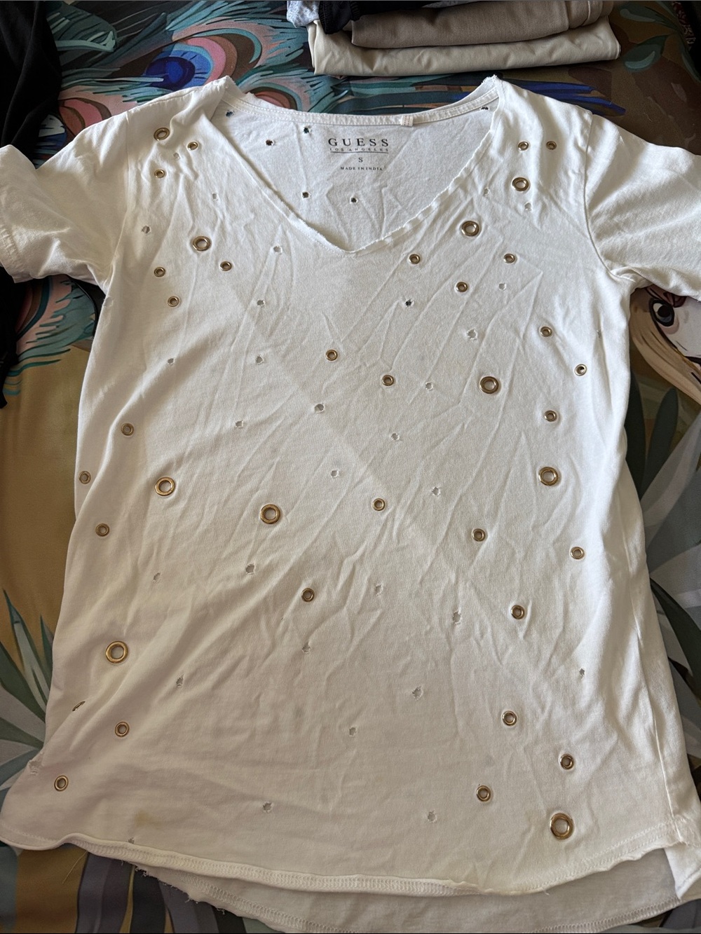 GUESS White Short-Sleeve V-Neck Tee with Gold Grommet Accents